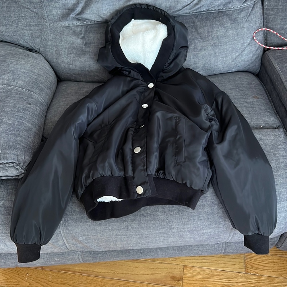 Brand new without tags black jacket size Medium